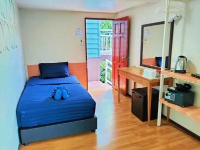 Triple Room with Balcony — Blue View House Phi Phi